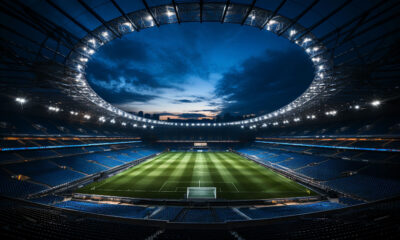 Empty soccer stadium bathed in the warm glow of dusk, ready to erupt with cheers for Euro 2024