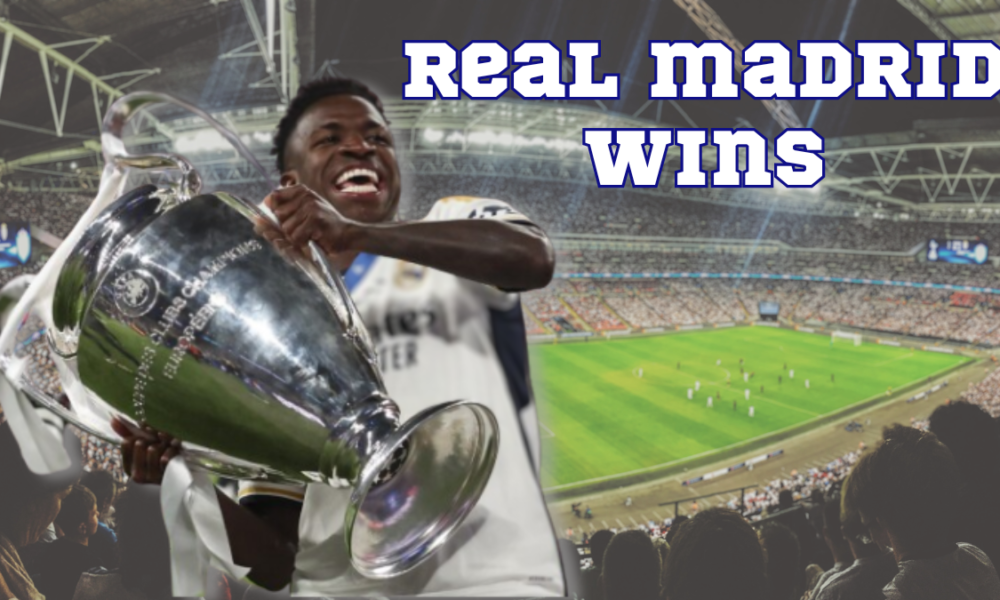 Vinicius Junior of Real Madrid lifts the trophy to celebrate their victory at the end of the UEFA Champions League final football match between Borussia Dortmund and Real Madrid
