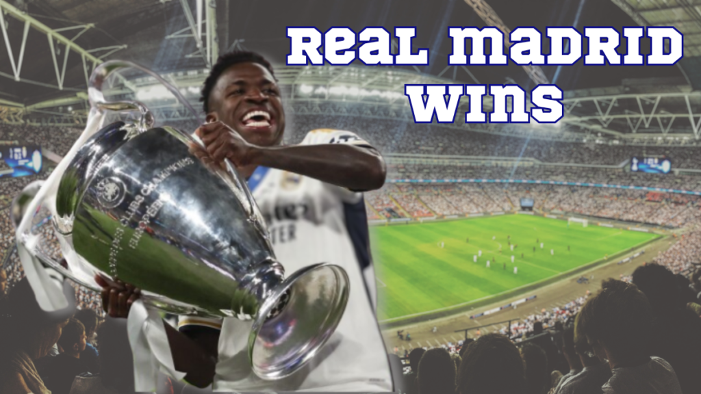 Vinicius Junior of Real Madrid lifts the trophy to celebrate their victory at the end of the UEFA Champions League final football match between Borussia Dortmund and Real Madrid